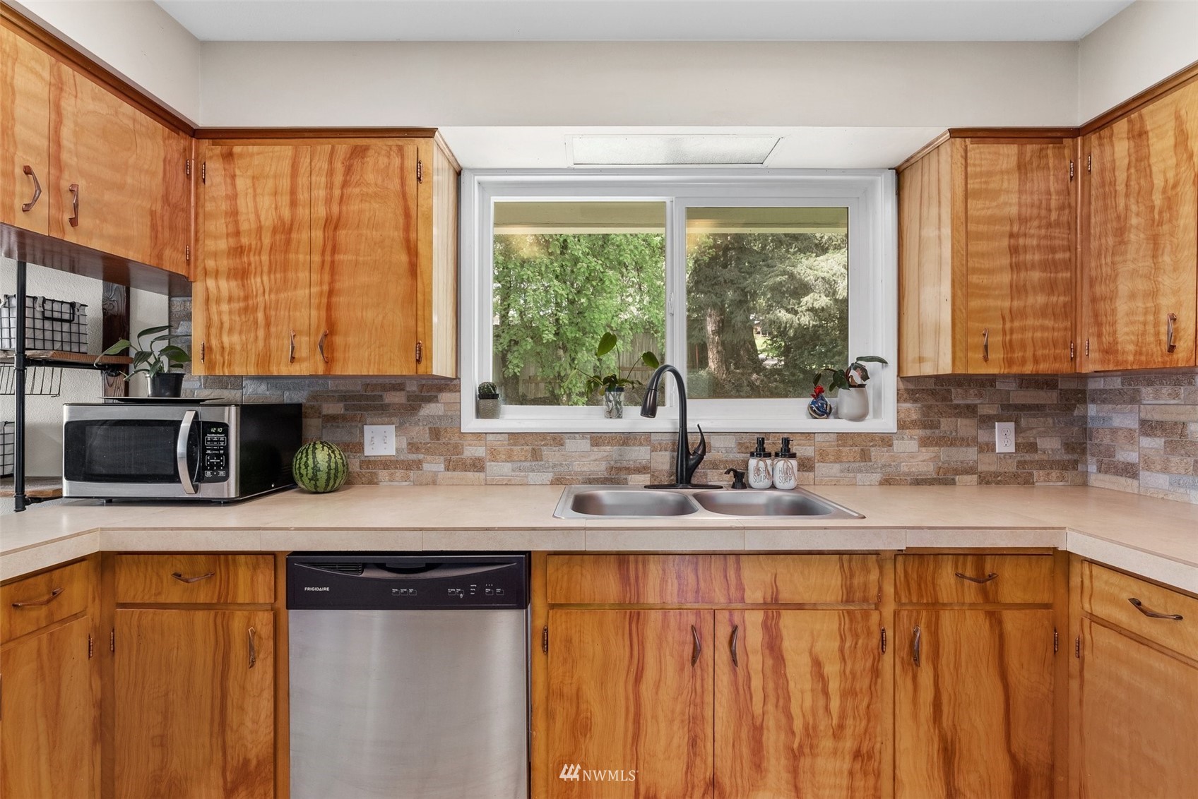 605 West Forest Napavine Road Chehalis, WA 98532 - Photo 12 of 34 a kitchen with stainless steel appliances a sink a stove a refrigerator and a sink