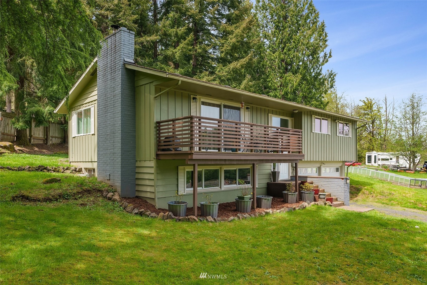 605 West Forest Napavine Road Chehalis, WA 98532 - Photo 4 of 34 a view of an house with backyard space and balcony