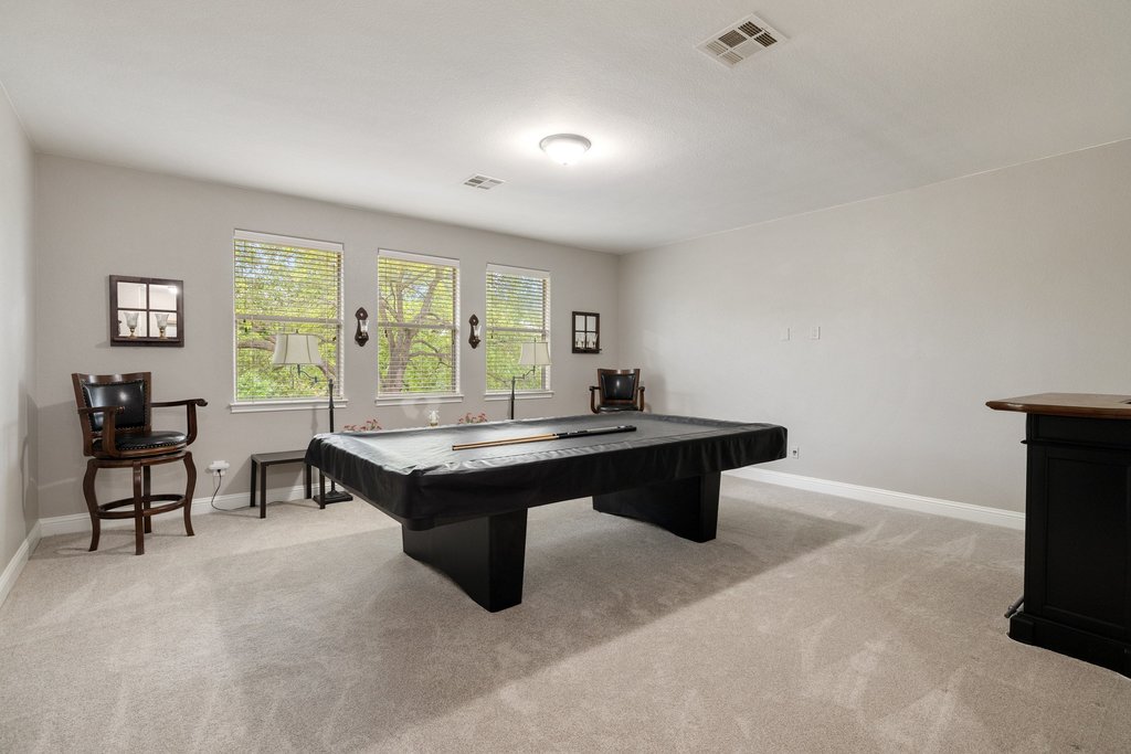 10800 Desert Willow Loop Austin, TX 78748 - Photo 23 of 36 a room with furniture pool table and windows