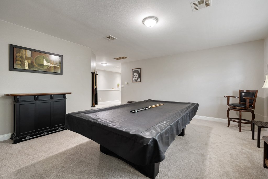 10800 Desert Willow Loop Austin, TX 78748 - Photo 24 of 36 a living room with hard wood flooring and a table