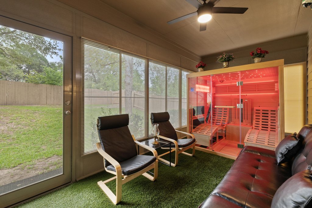 10800 Desert Willow Loop Austin, TX 78748 - Photo 31 of 36 a living room with patio furniture and a floor to ceiling window