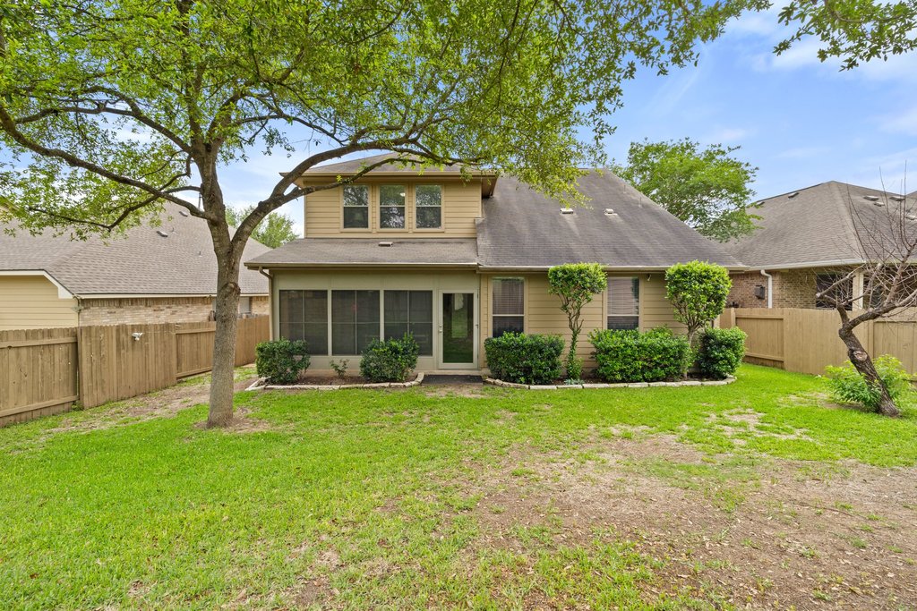 10800 Desert Willow Loop Austin, TX 78748 - Photo 34 of 36 a front view of a house with garden and porch