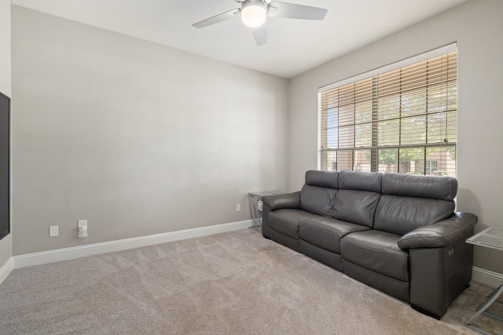 10800 Desert Willow Loop Austin, TX 78748 - Photo 4 of 36 a living room with furniture and a window