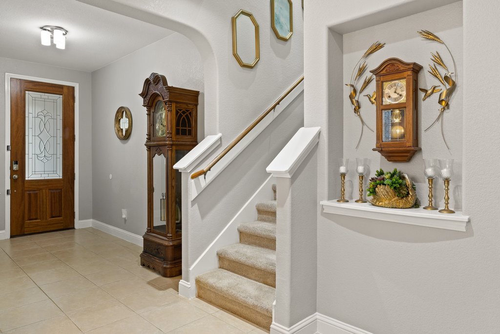 10800 Desert Willow Loop Austin, TX 78748 - Photo 5 of 36 a view of entryway with wooden floor