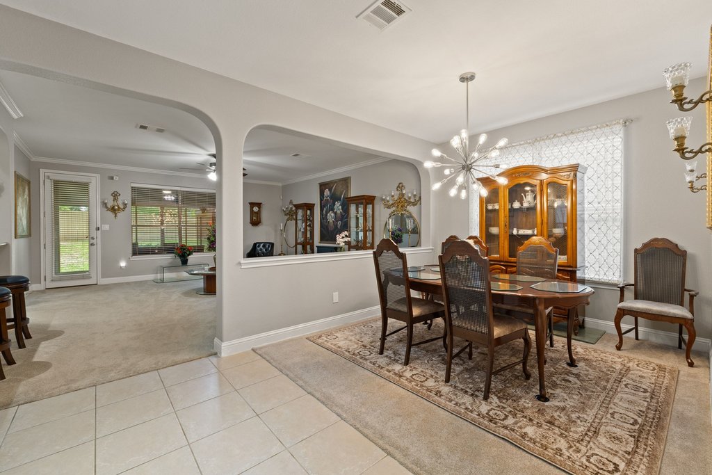 10800 Desert Willow Loop Austin, TX 78748 - Photo 6 of 36 a view of a dining room with furniture