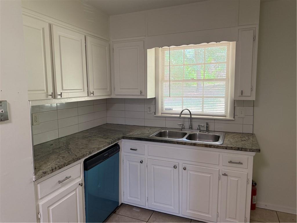 3460 Boring Road Decatur, GA 30034 - Photo 3 of 16 a kitchen with granite countertop white cabinets and a window