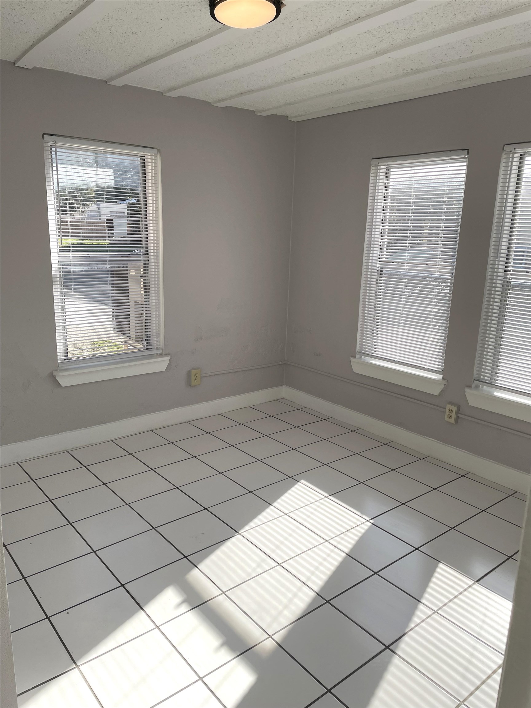 147 D Riberia Street St. Augustine, FL 32084 - Photo 5 of 9 a view of an empty room and window