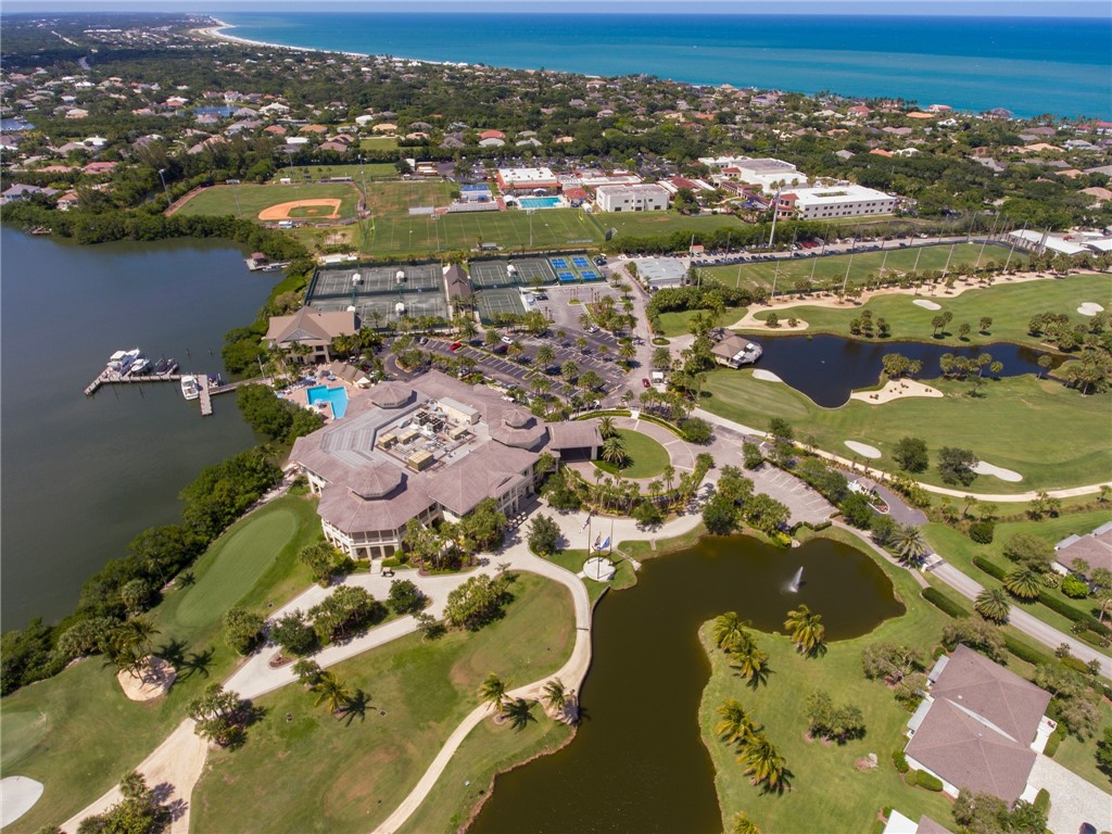 1880 Bay Road, Unit I319 Vero Beach, FL 32963 - Photo 32 of 36 an aerial view of residential houses with outdoor space