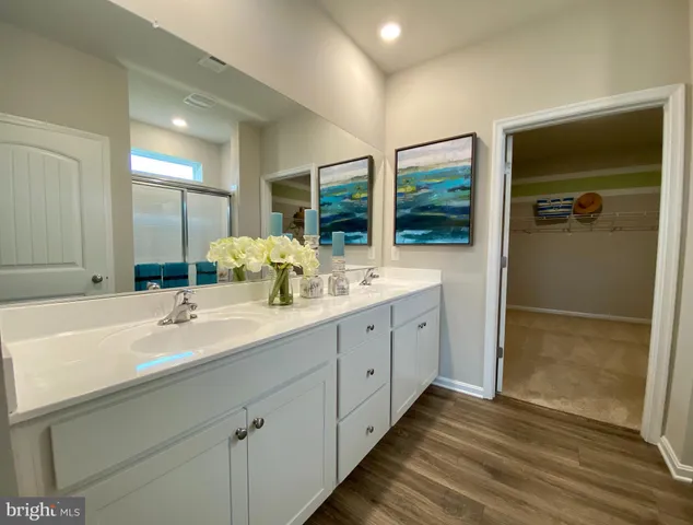 a front view of a house with a yard table and chairs