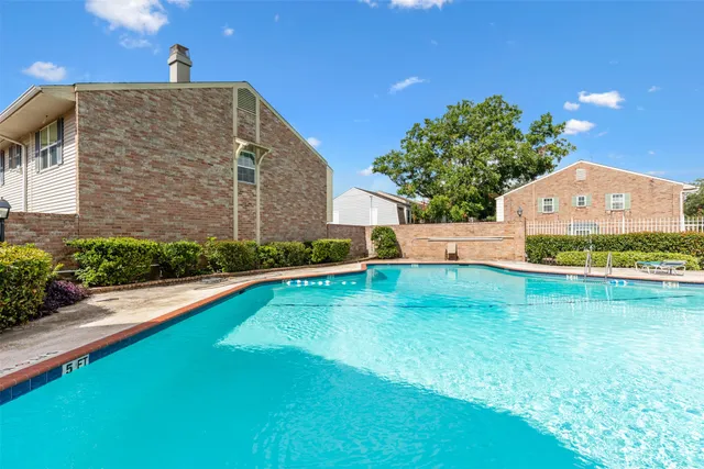 a view of a building with a street