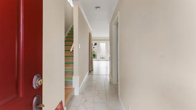 a view of hallway with stairs