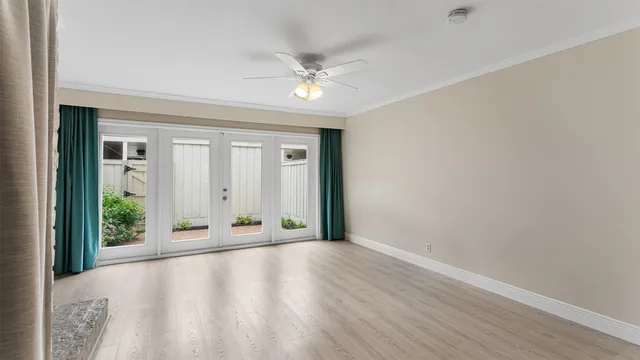 a view of a livingroom with wooden floor