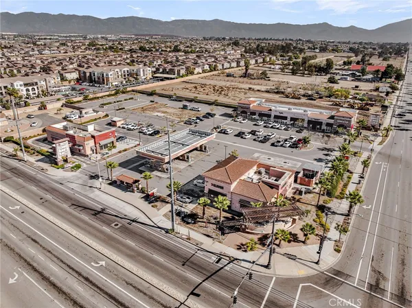 a picture of a bench in front of a wall