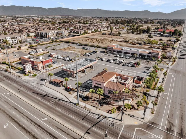 a picture of a bench in front of a wall