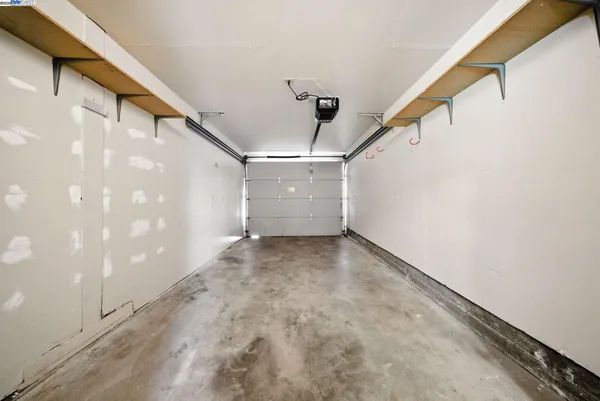 a view of a hallway with stairs