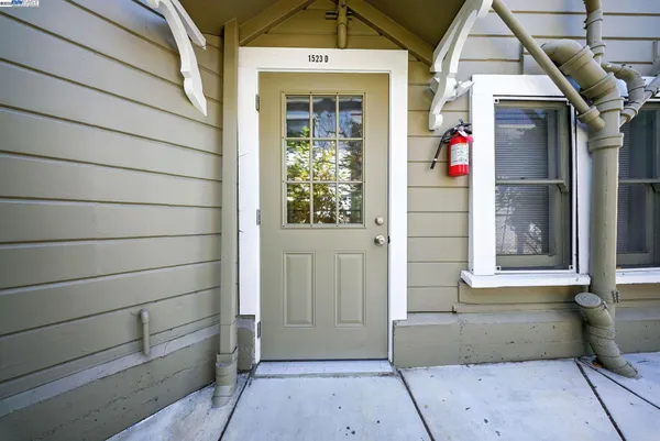a view of a house with a door and a window