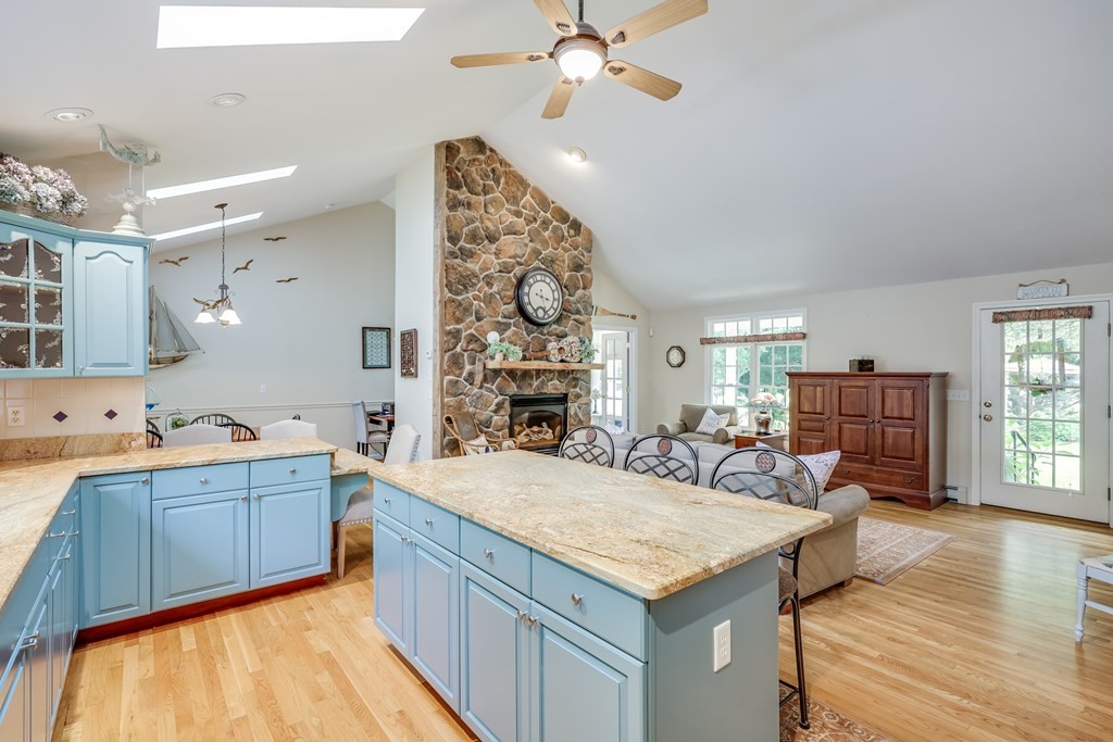20 Courtney Road Harwich, MA 02645 - Photo 16 of 42 a kitchen with sink cabinets and wooden floor