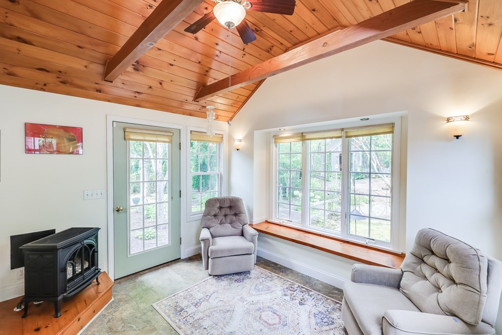 20 Courtney Road Harwich, MA 02645 - Photo 17 of 42 a living room with furniture and a floor to ceiling window