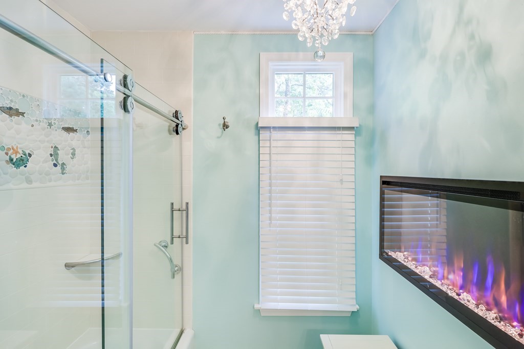 20 Courtney Road Harwich, MA 02645 - Photo 29 of 42 a bathroom with a shower and a window