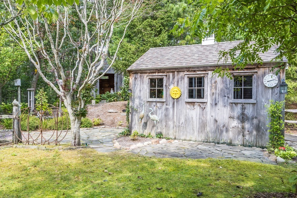 20 Courtney Road Harwich, MA 02645 - Photo 38 of 42 front view of a house with a yard