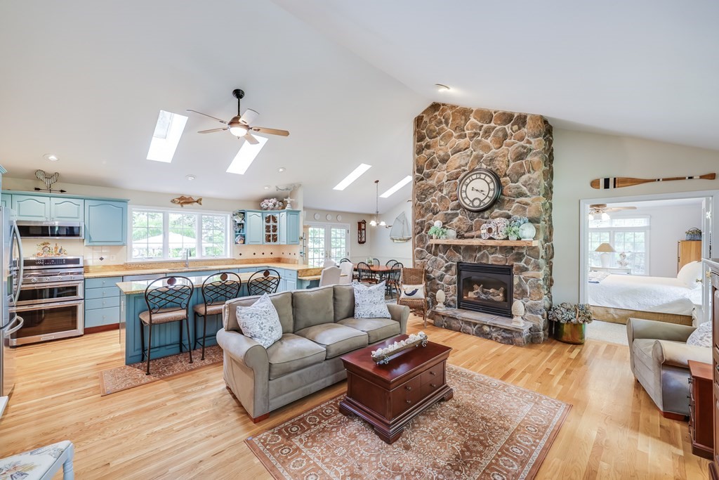 20 Courtney Road Harwich, MA 02645 - Photo 9 of 42 a living room with furniture and a fireplace