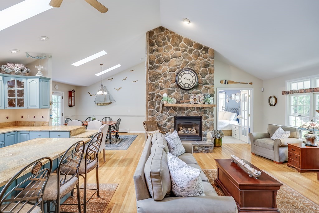 20 Courtney Road Harwich, MA 02645 - Photo 10 of 42 a living room with furniture and a fireplace