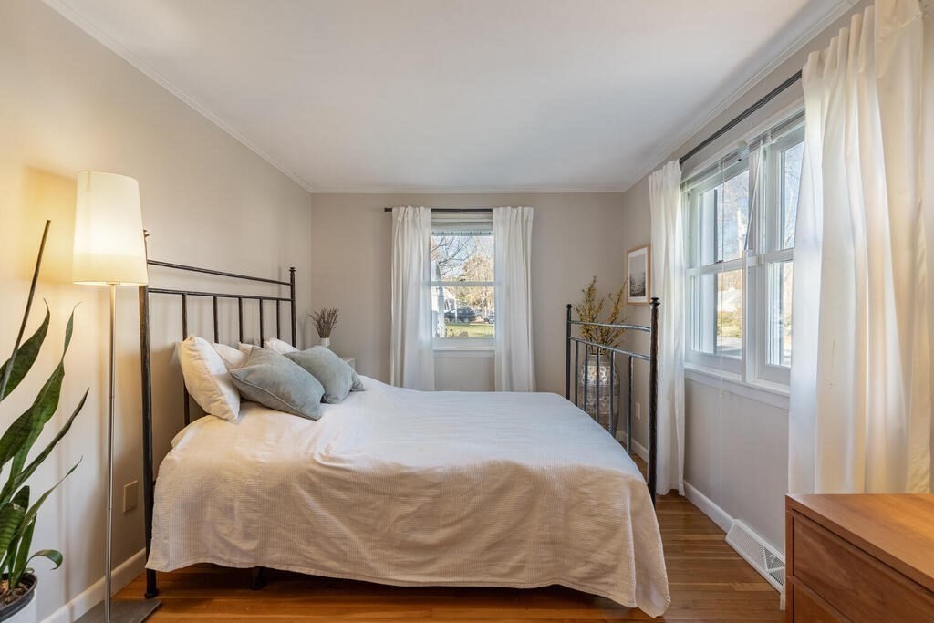 15 Forrest Road Topsfield, MA 01983 - Photo 14 of 26 a bedroom with a bed and window
