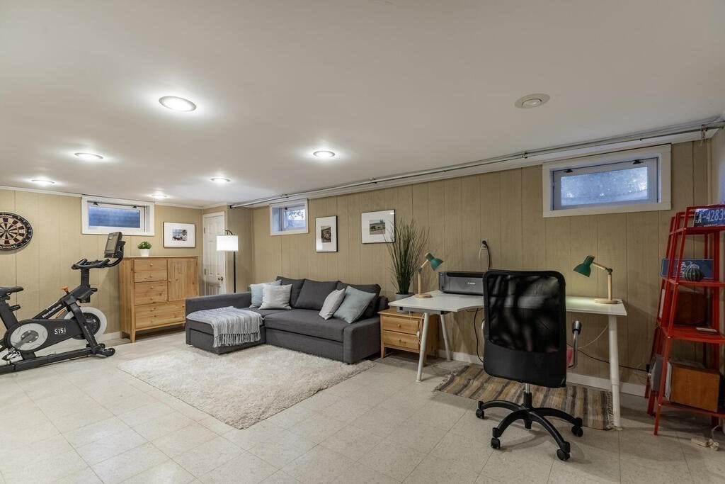 15 Forrest Road Topsfield, MA 01983 - Photo 19 of 26 a view of a livingroom with workspace and a couch