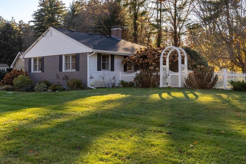 15 Forrest Road Topsfield, MA 01983 - Photo 2 of 26 a view of a house with a swimming pool