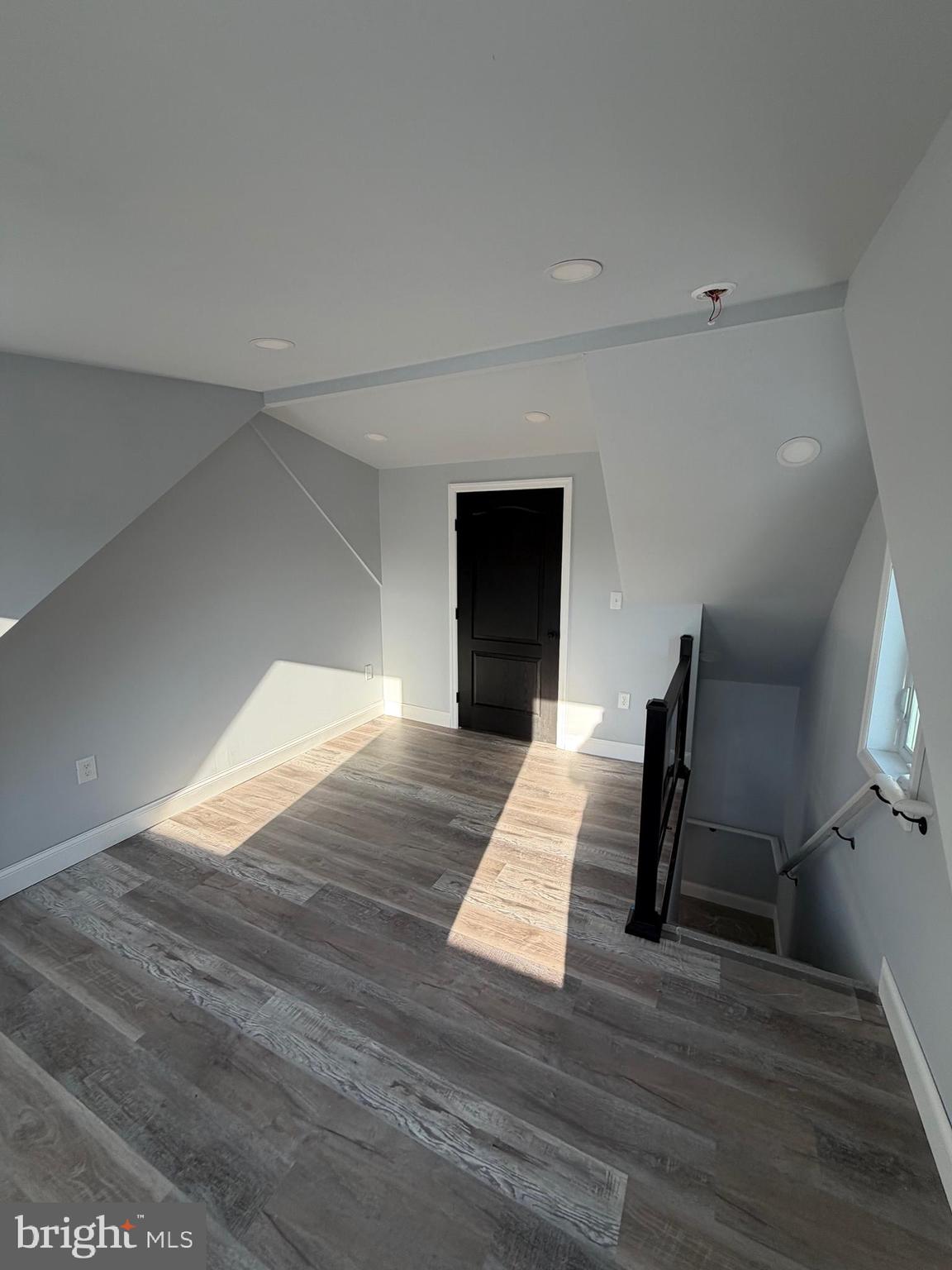 514 Race Street Palmyra, NJ 08065 - Photo 11 of 14 a view of a livingroom with wooden floor and staircase