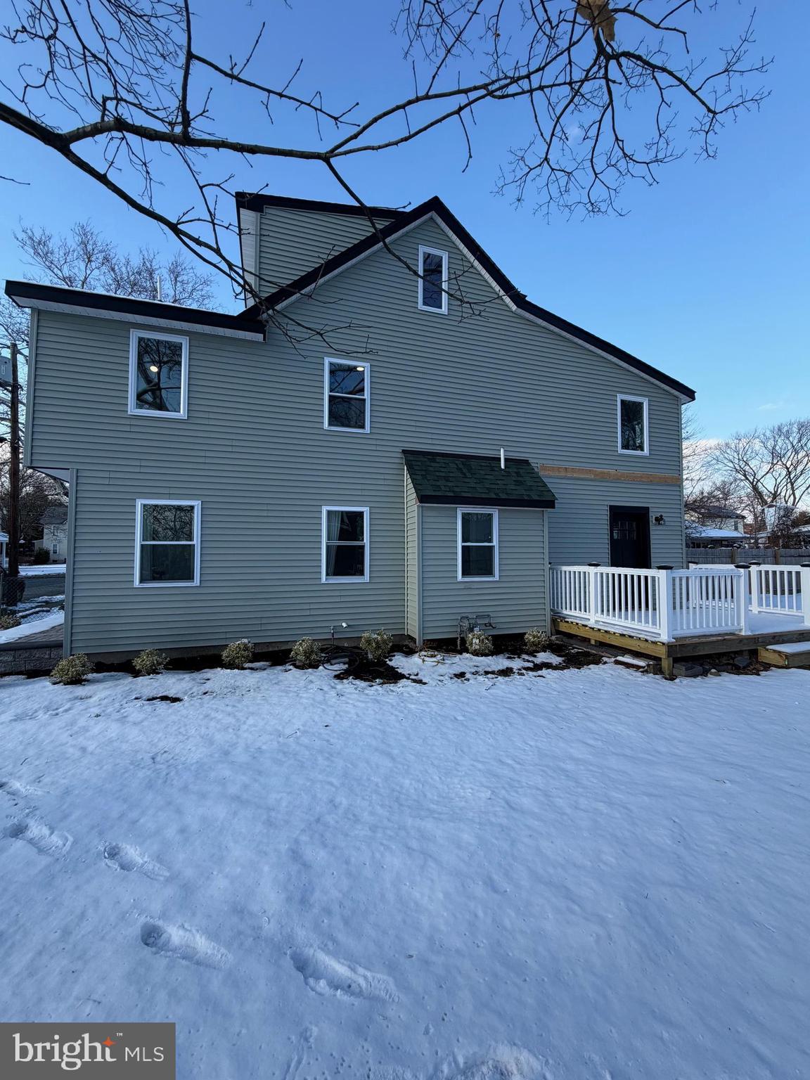514 Race Street Palmyra, NJ 08065 - Photo 2 of 14 a front view of house with yard and trees in the background