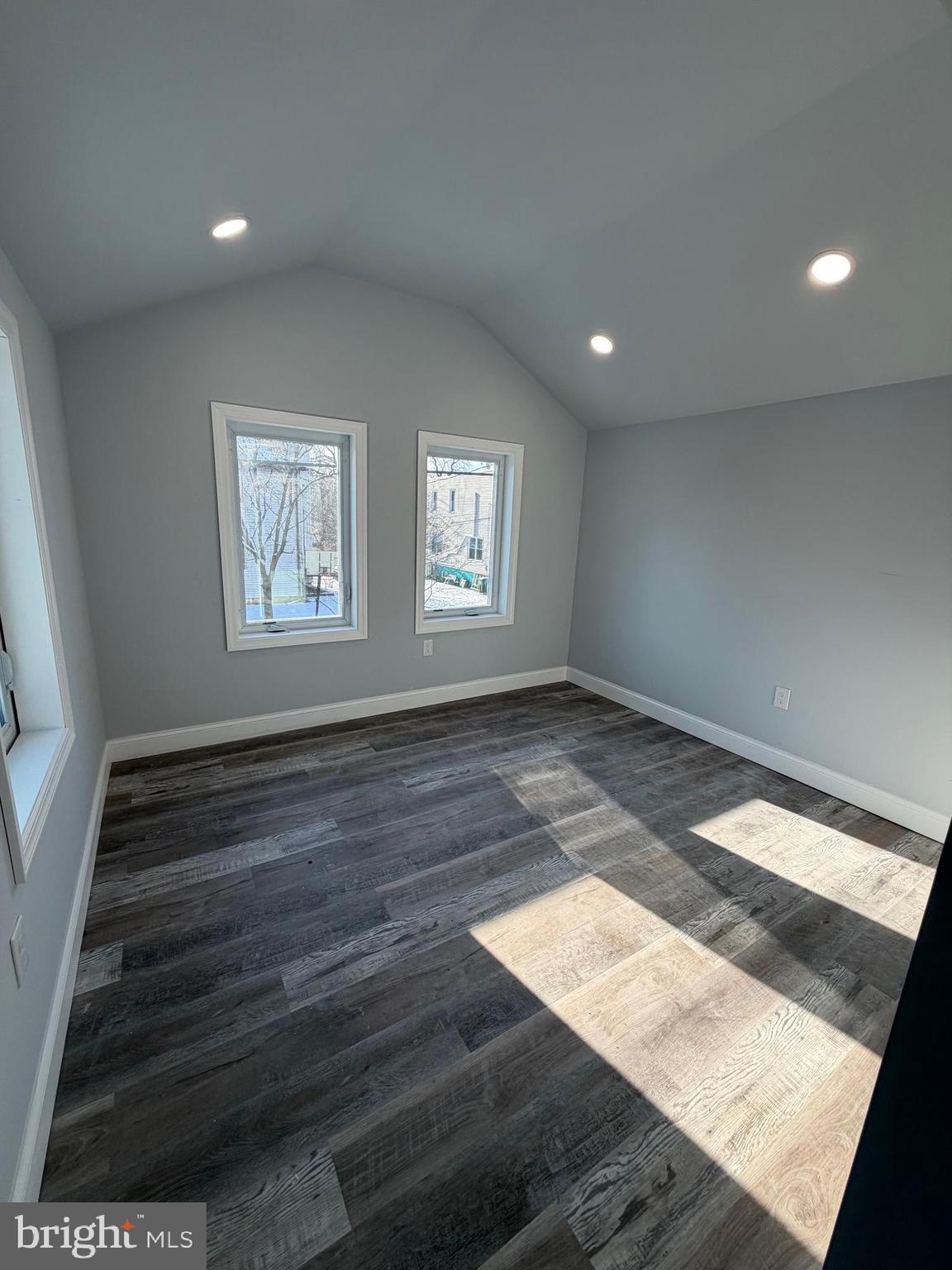 514 Race Street Palmyra, NJ 08065 - Photo 9 of 14 a view of an empty room with wooden floor and a window