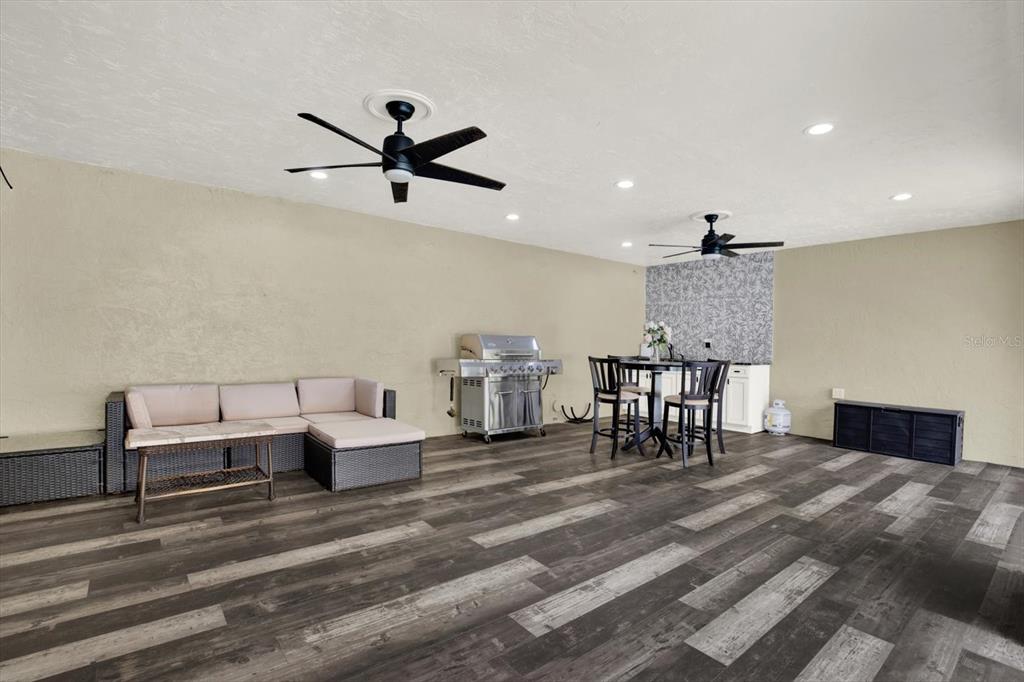 7487 River Country Drive Weeki Wachee, FL 34607 - Photo 42 of 53 a living room with furniture