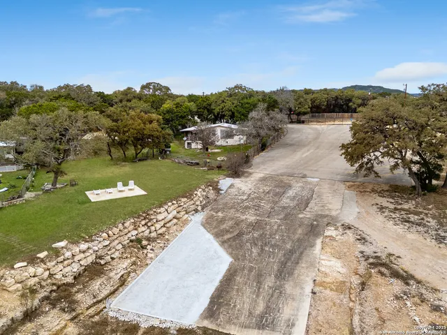 a view of a lake with mountains in the background