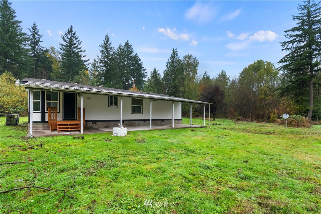 259 Sommerville Road Chehalis, WA 98532 - Photo 23 of 25 a view of a house with backyard