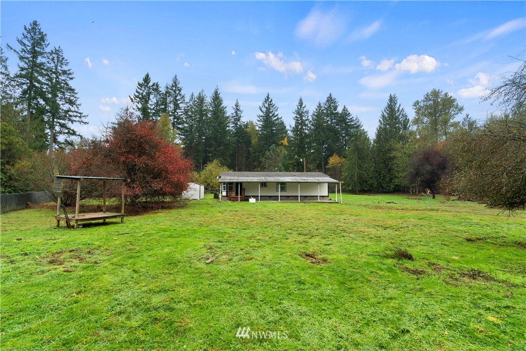 259 Sommerville Road Chehalis, WA 98532 - Photo 24 of 25 a view of a house with backyard and sitting area