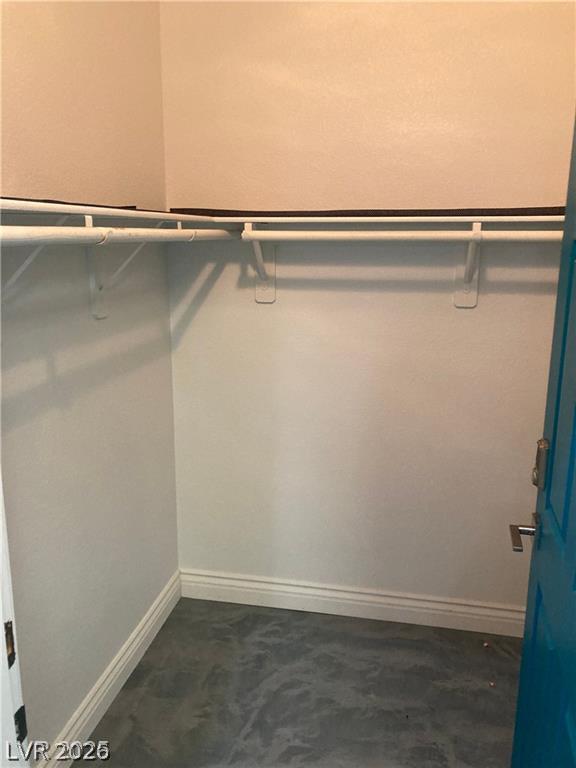 9050 West Warm Springs Road, Unit 1027 Las Vegas, NV 89148 - Photo 21 of 44 Functional and tidy, this closet provides ample storage for wardrobe essentials.