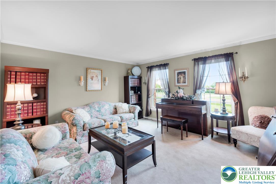 3830 McIntosh Drive Orefield, PA 18069 - Photo 5 of 36 a living room with furniture and a window