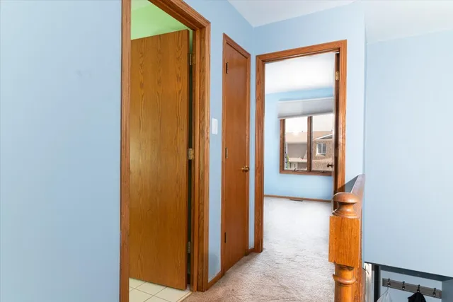 a view of entryway with a small yard