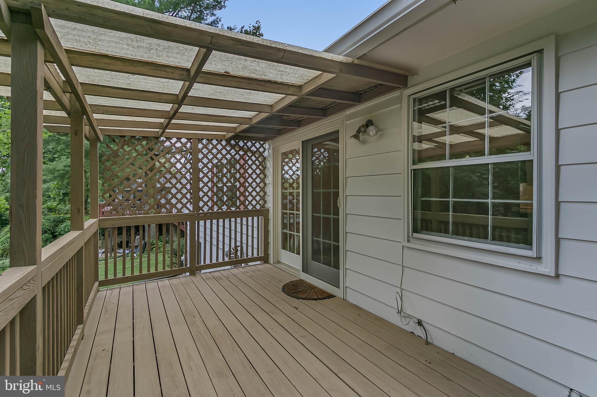 3229 Birchtree Lane Silver Spring, MD 20906 - Photo 7 of 44 Covered deck perfect for outdoor dining