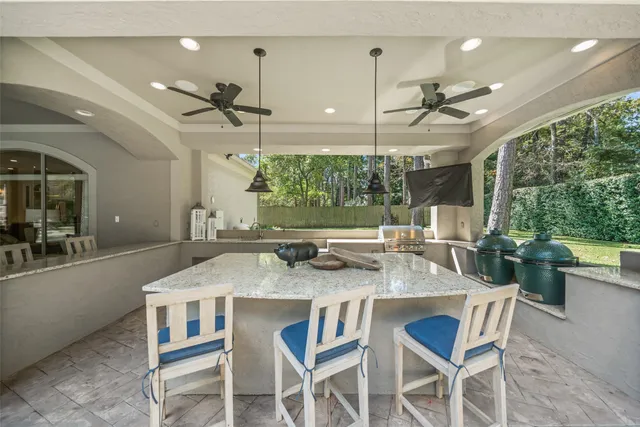 a kitchen with a table and chairs
