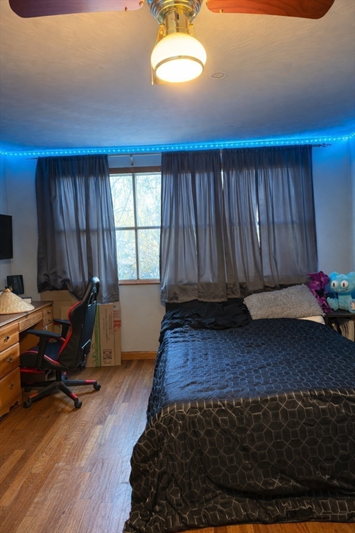389 West Main Street Dudley, MA 01571 - Photo 14 of 19 a view of a room with wooden floor and furniture