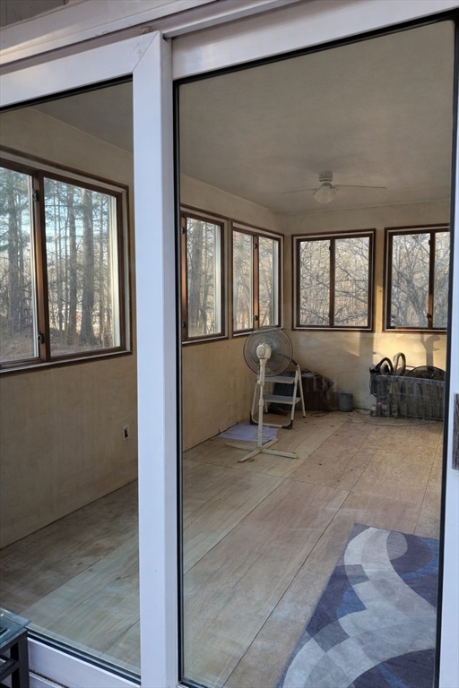 389 West Main Street Dudley, MA 01571 - Photo 15 of 19 a view of a livingroom with furniture and windows