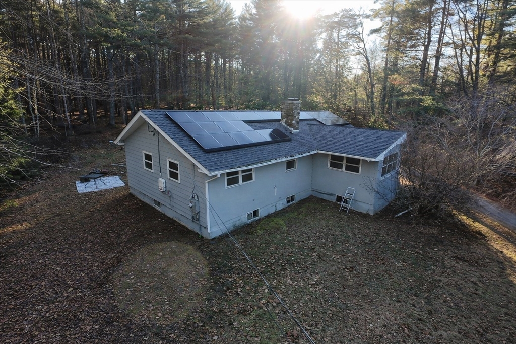 389 West Main Street Dudley, MA 01571 - Photo 2 of 19 a view of a house with a yard