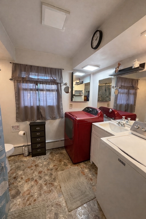 389 West Main Street Dudley, MA 01571 - Photo 10 of 19 a kitchen with a stove and a refrigerator