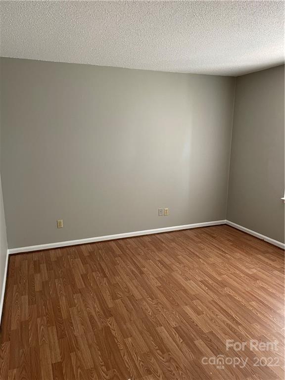 2306 Startown Road Lincolnton, NC 28092 - Photo 2 of 6 a view of an empty room and wooden floor