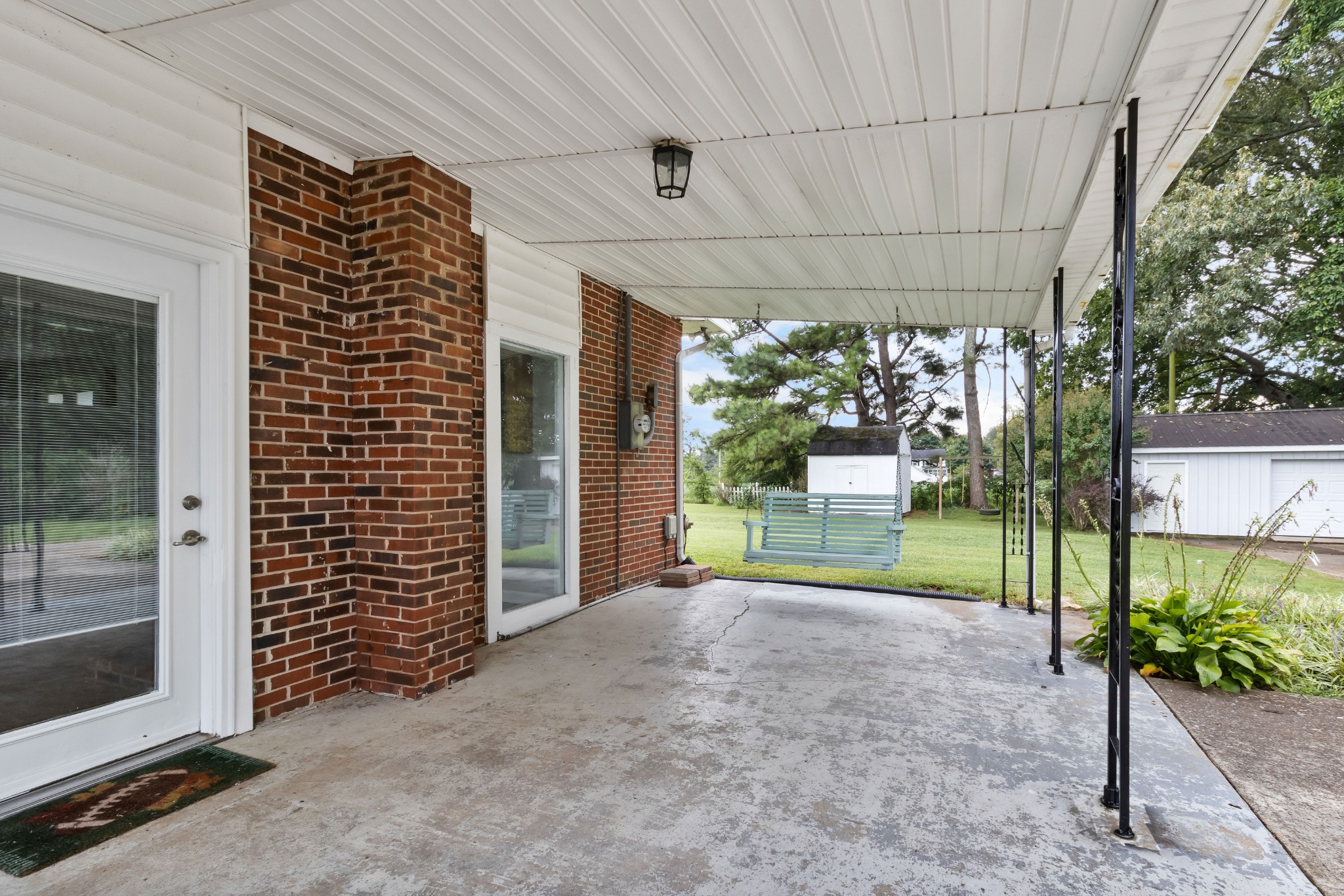 3674 Rossview Road Adams, TN 37010 - Photo 4 of 40 a view of a porch with furniture and garden
