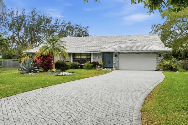 $719,900 | 8870 Northwest 49th Drive, Coral Springs, FL 33067