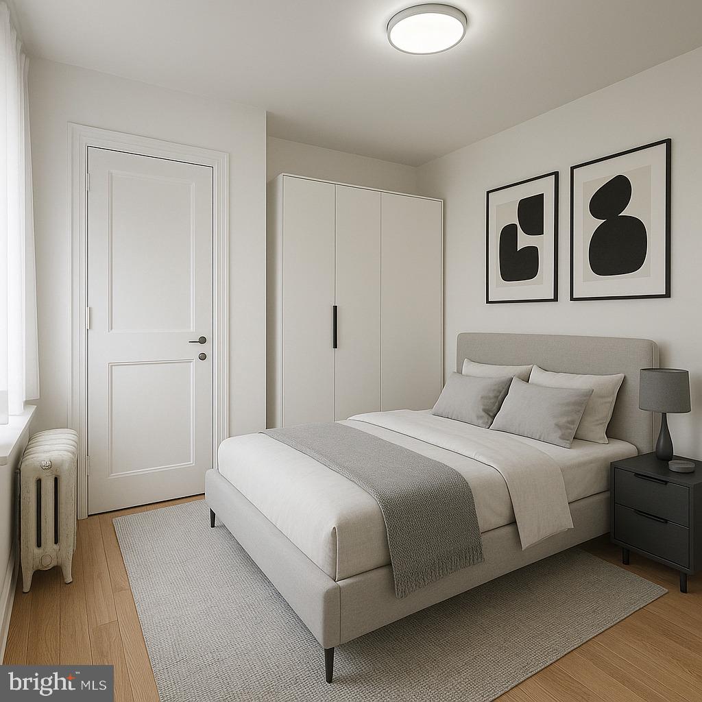 260 West Queen Lane Philadelphia, PA 19144 - Photo 15 of 34 a bedroom with a bed and a mirror