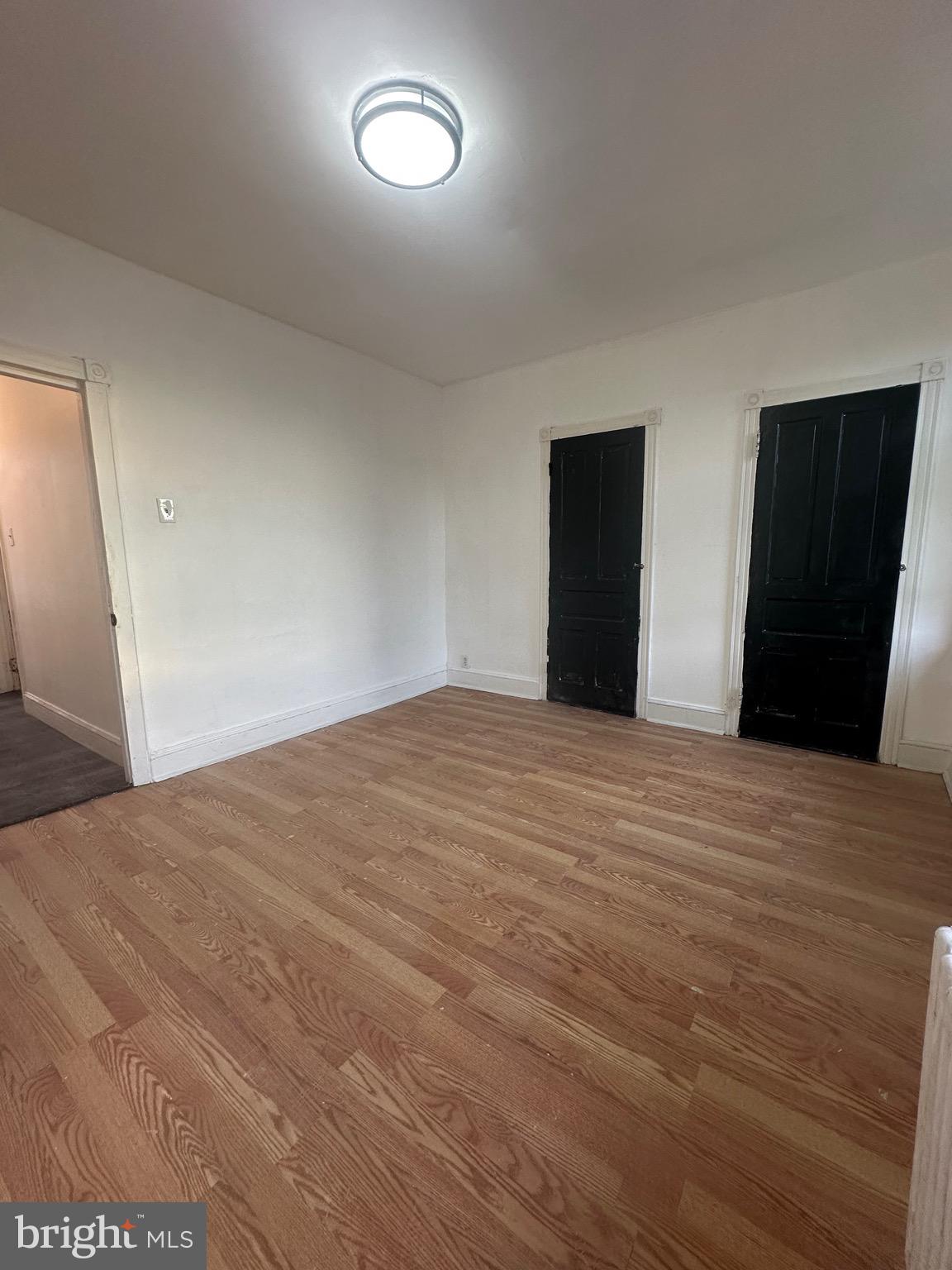 260 West Queen Lane Philadelphia, PA 19144 - Photo 18 of 34 a bedroom with a bed and a mirror